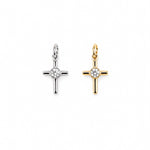 Minimalist cross charm with a bezel-set round cubic zirconia center. Crafted in 18K Gold Filled and Rhodium for necklaces, bracelets, and hoop earrings.