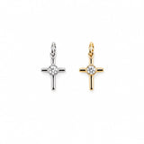 Minimalist cross charm with a bezel-set round cubic zirconia center. Crafted in 18K Gold Filled and Rhodium for necklaces, bracelets, and hoop earrings.