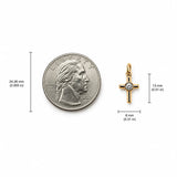 Minimalist cross charm with a bezel-set round cubic zirconia center. Crafted in 18K Gold Filled and Rhodium for necklaces, bracelets, and hoop earrings.