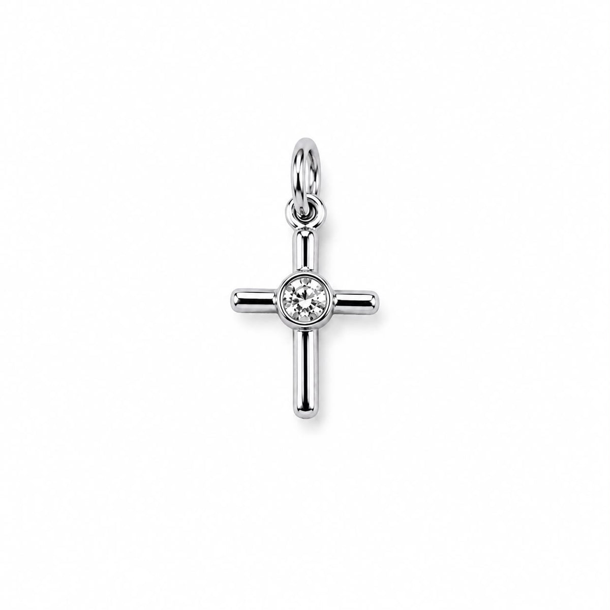 A polished silver cross pendant sparkles with a bezel-set diamond at its center against a white background.