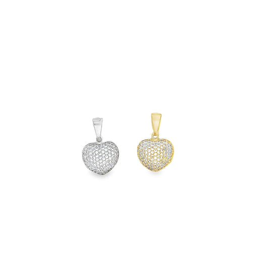 Two pavé-set diamond heart pendants rest side-by-side, featuring a silver and a gold option against a clean white background.