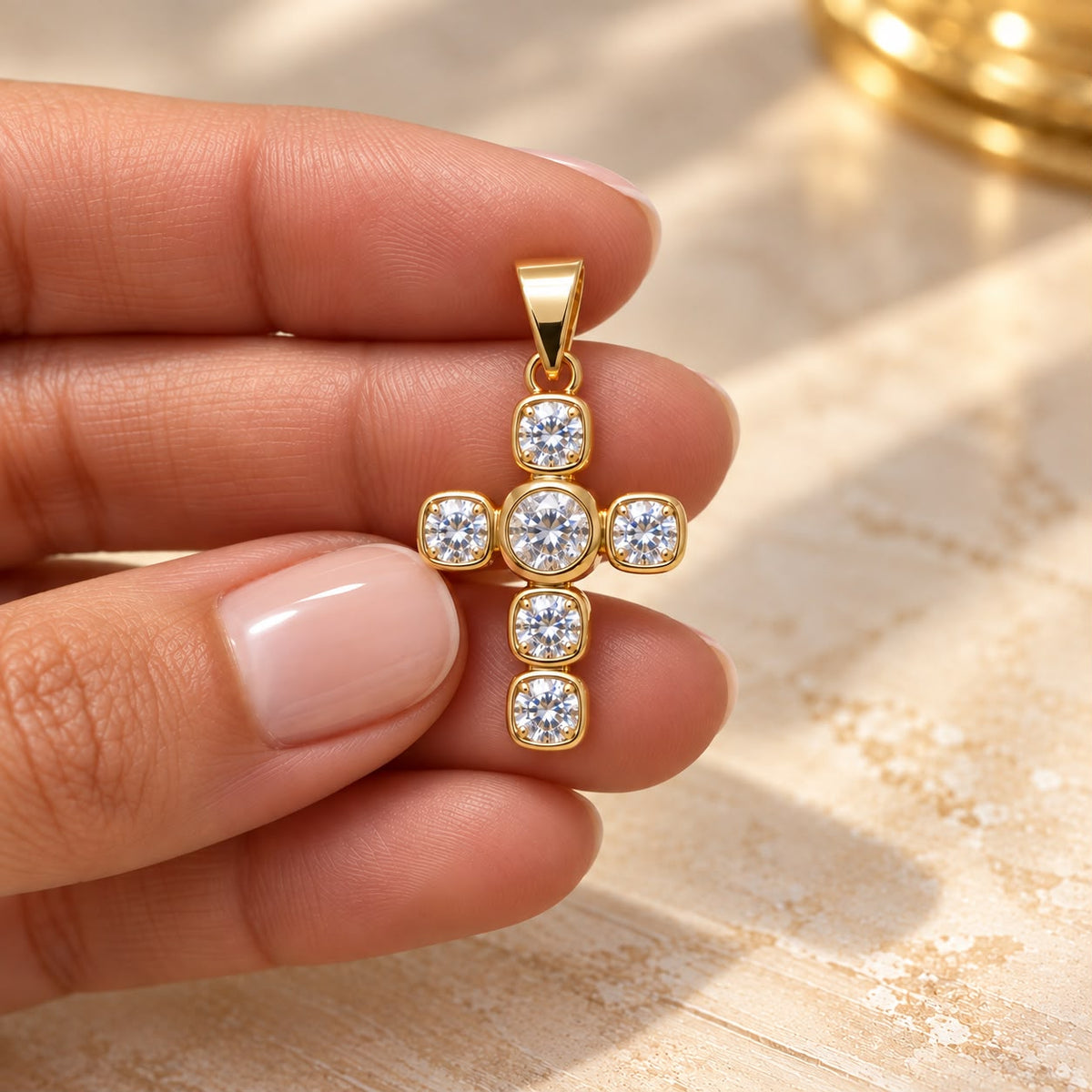 Shop a 18K Gold Filled cross pendant featuring a colorful center stone and sparkling clear CZ accents. Available in multiple stone color options.