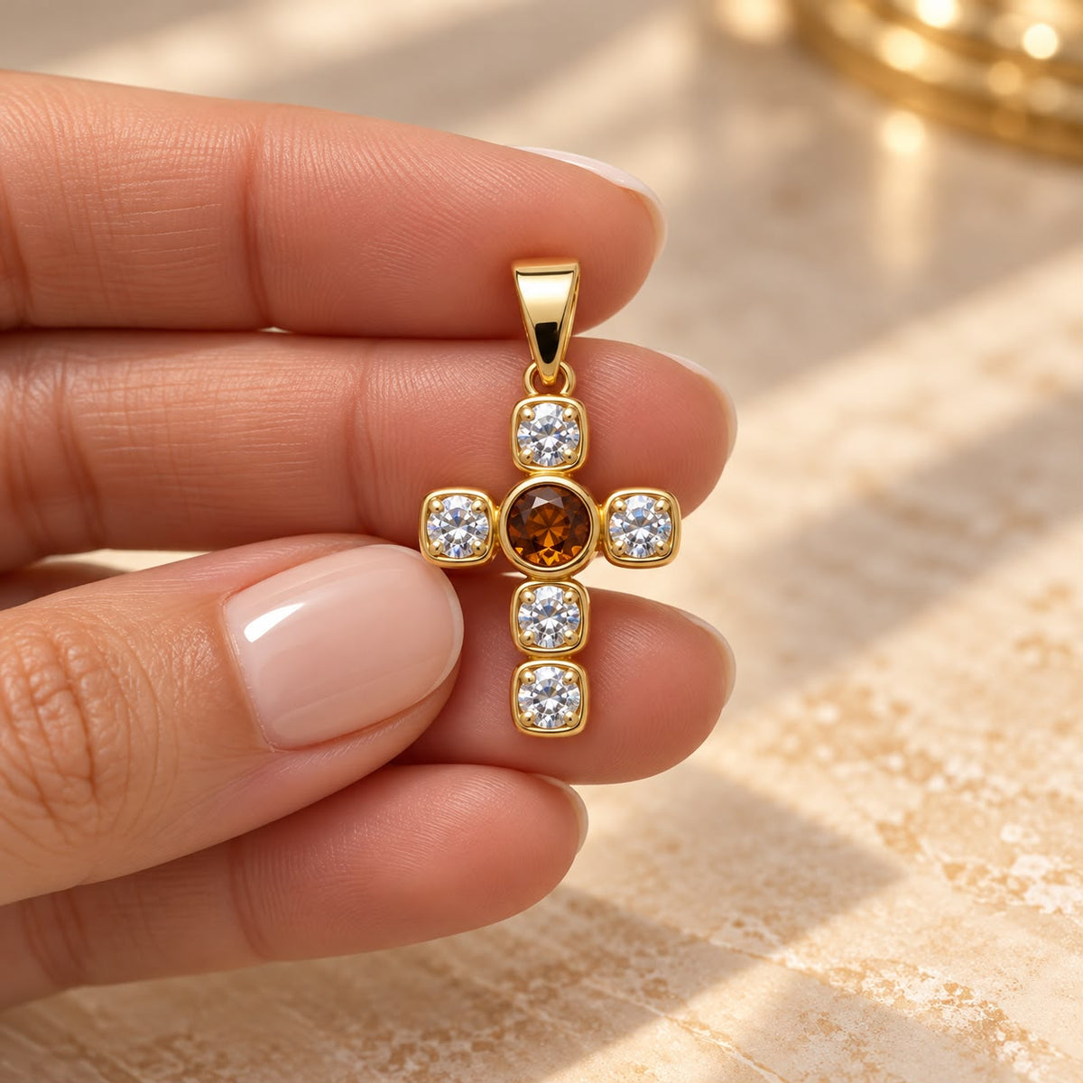 Shop a 18K Gold Filled cross pendant featuring a colorful center stone and sparkling clear CZ accents. Available in multiple stone color options.