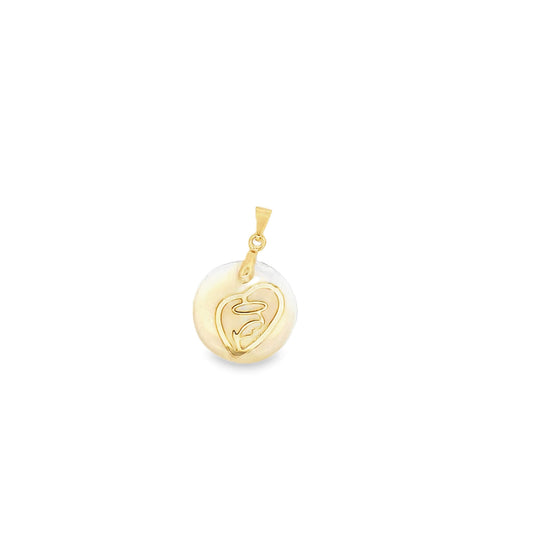 A round gold pendant features a mother-of-pearl inlay engraved with an abstract silhouette design.