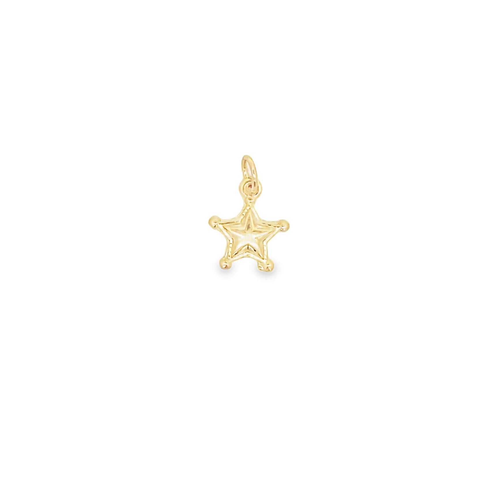 A small gold star charm hangs from a delicate jump ring against a plain white background.