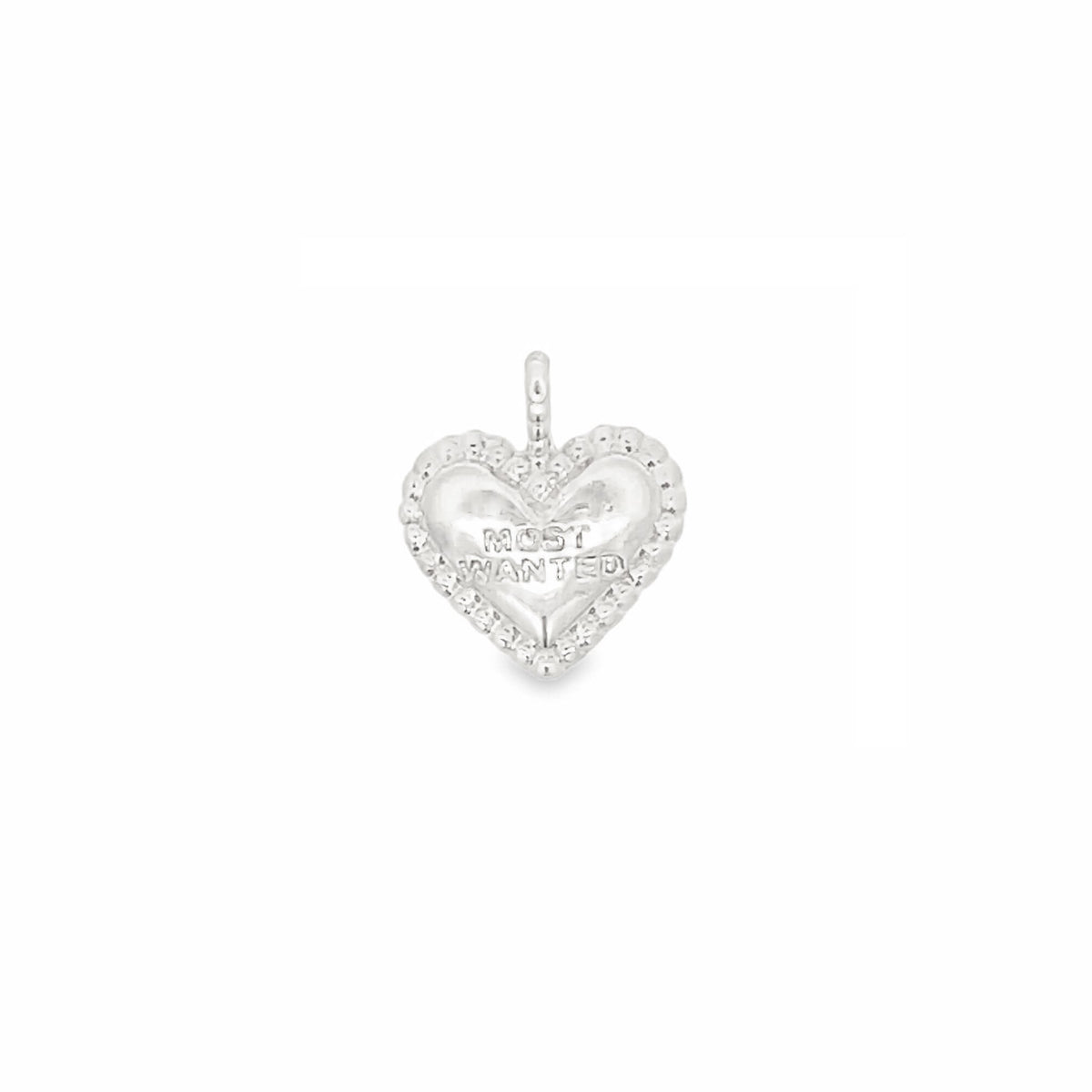 A silver heart-shaped pendant engraved with the words "MOST WANTED" features a beaded border against a plain white background.