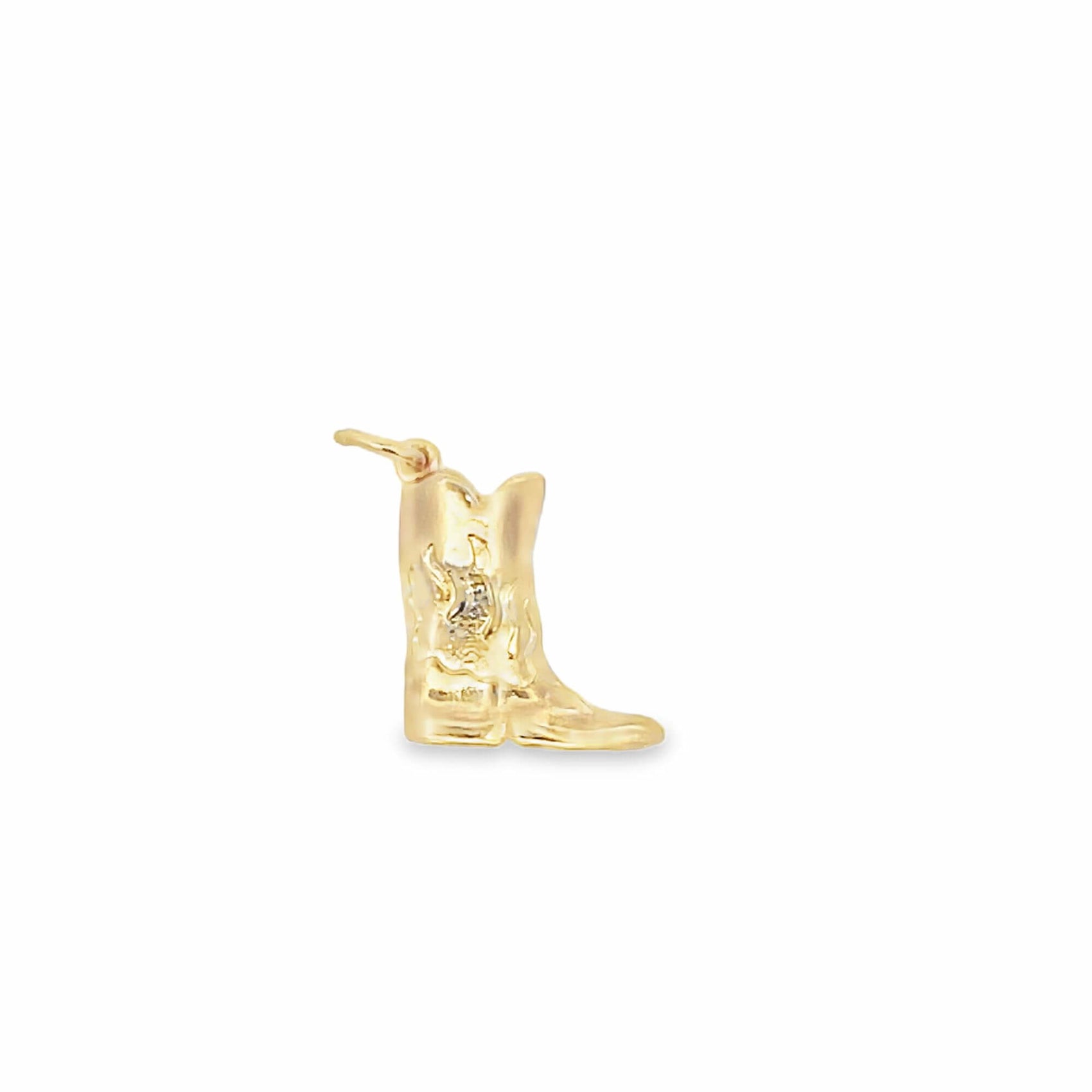 A miniature gold cowboy boot charm features intricate stitching detail and an attached jump ring on a plain white background.