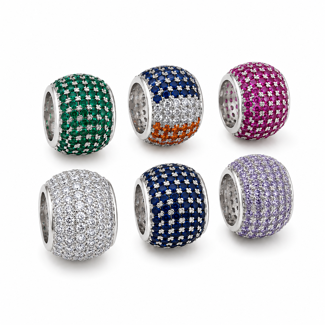Six shimmering sterling silver charm beads display vibrant pavé-set gemstones in green, multicolored, pink, white, blue, and purple against a clean white background.
