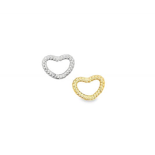 A silver and a gold twisted heart-shaped hoop earring rest against a clean white background.