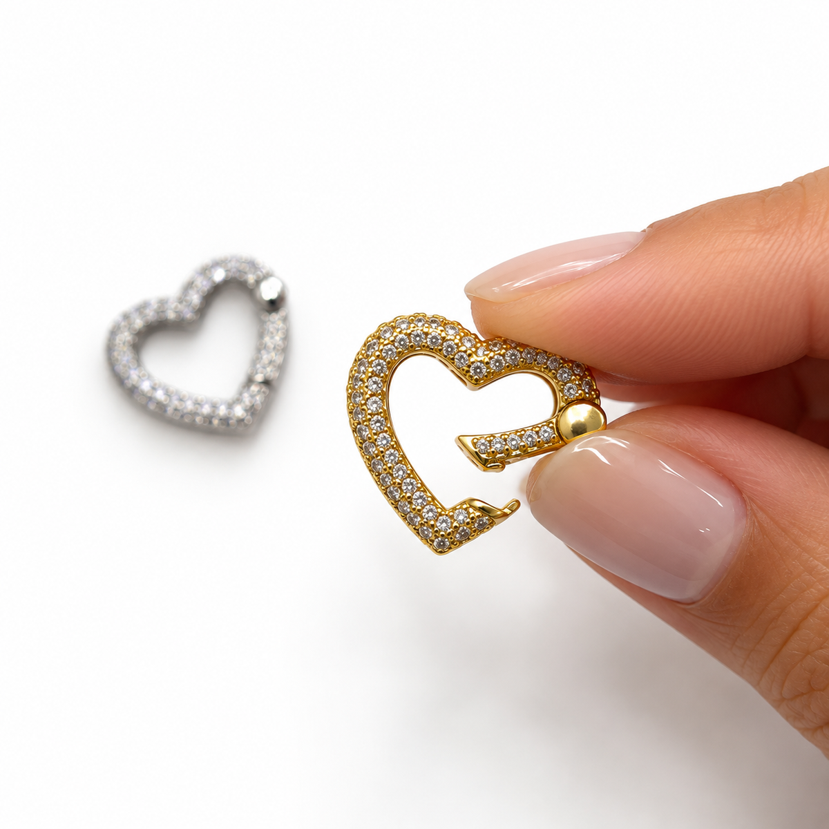 Shop a heart-shaped CZ jewelry clasp in 18K Gold Filled or Rhodium. A beautiful functional connector for chains, necklaces, bracelets, charms and pendants.