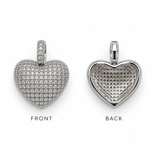 Shop a luxurious CZ heart pendant featuring round and baguette-style Cubic Zirconia. Available in Clear and Turquoise with 18K Gold Filled or Rhodium finish.