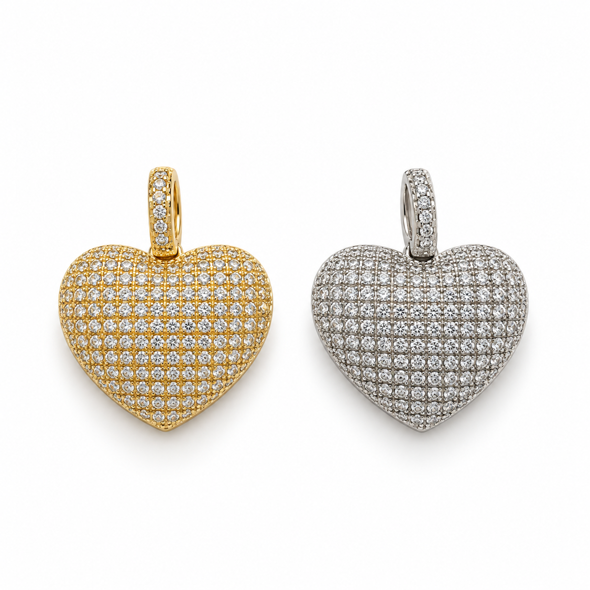 Shop a luxurious CZ heart pendant featuring round and baguette-style Cubic Zirconia. Available in Clear and Turquoise with 18K Gold Filled or Rhodium finish.