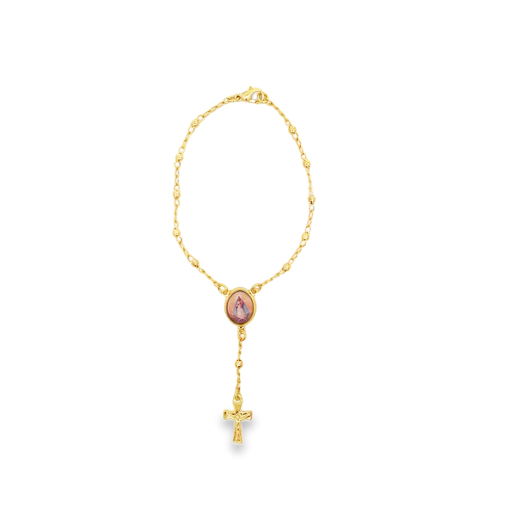 A delicate gold rosary bracelet features a small oval centerpiece medallion of the Virgin Mary and a dangling crucifix charm.