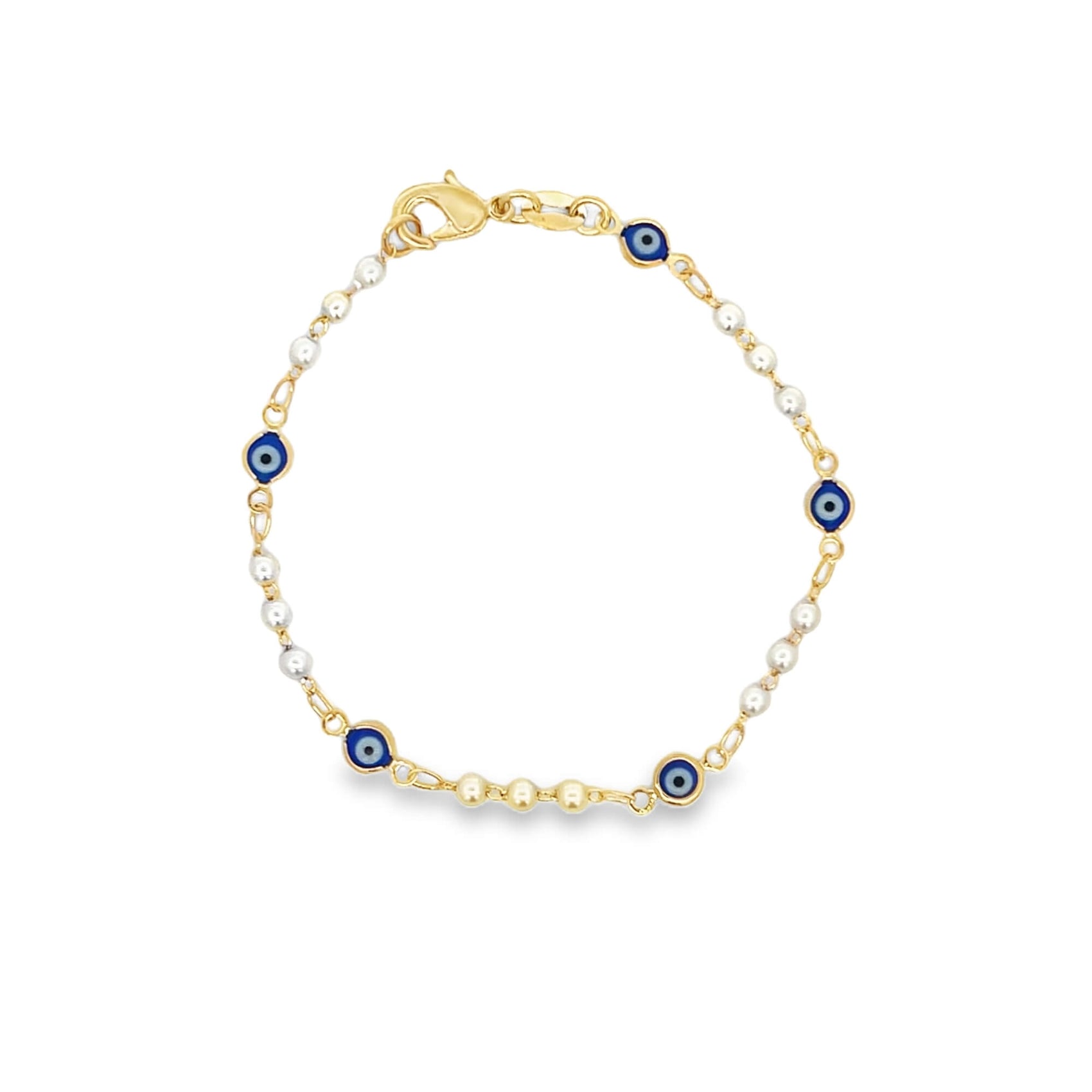 A delicate gold chain bracelet features alternating white beads and blue evil eye charms.