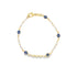 A delicate gold chain bracelet features alternating white beads and blue evil eye charms.