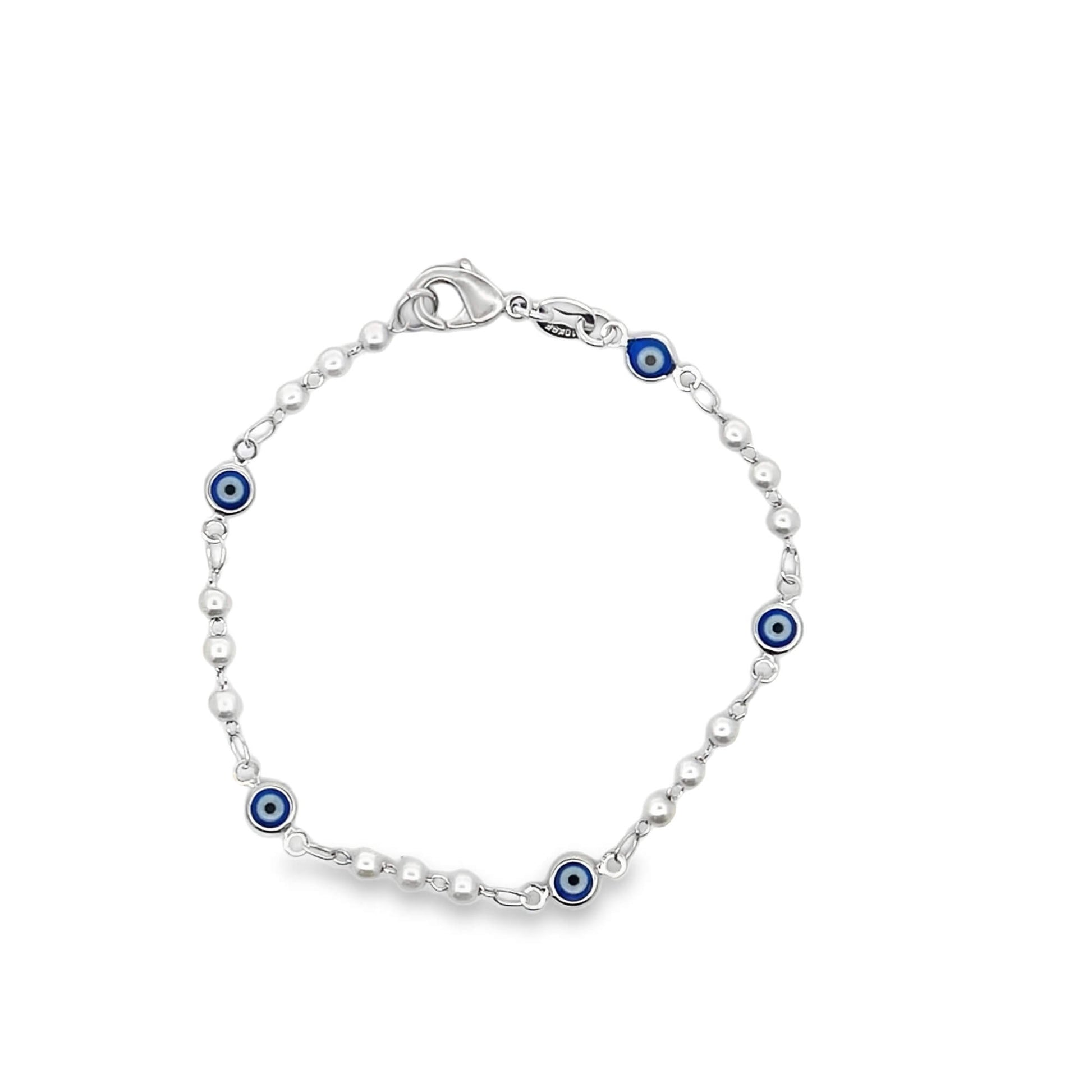 A silver bead chain bracelet features blue and white evil eye charms interspersed along its length against a white background.
