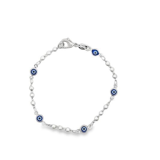 A silver bead chain bracelet features blue and white evil eye charms interspersed along its length against a white background.