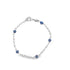 A silver bead chain bracelet features blue and white evil eye charms interspersed along its length against a white background.