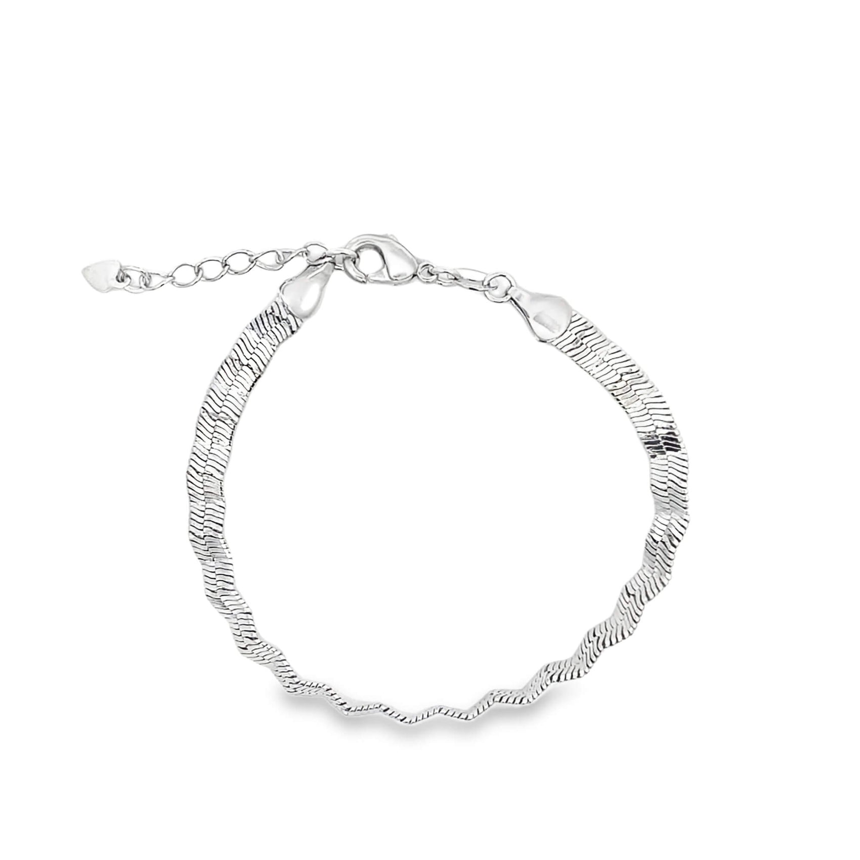A sleek sterling silver herringbone chain bracelet displays a lobster clasp and an adjustable extension chain with a tiny heart charm.