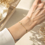 Elegant 18K Gold Filled station necklace featuring geometric open-link accents and bezel-set cubic zirconia. Lightweight, modern and perfect for layering.