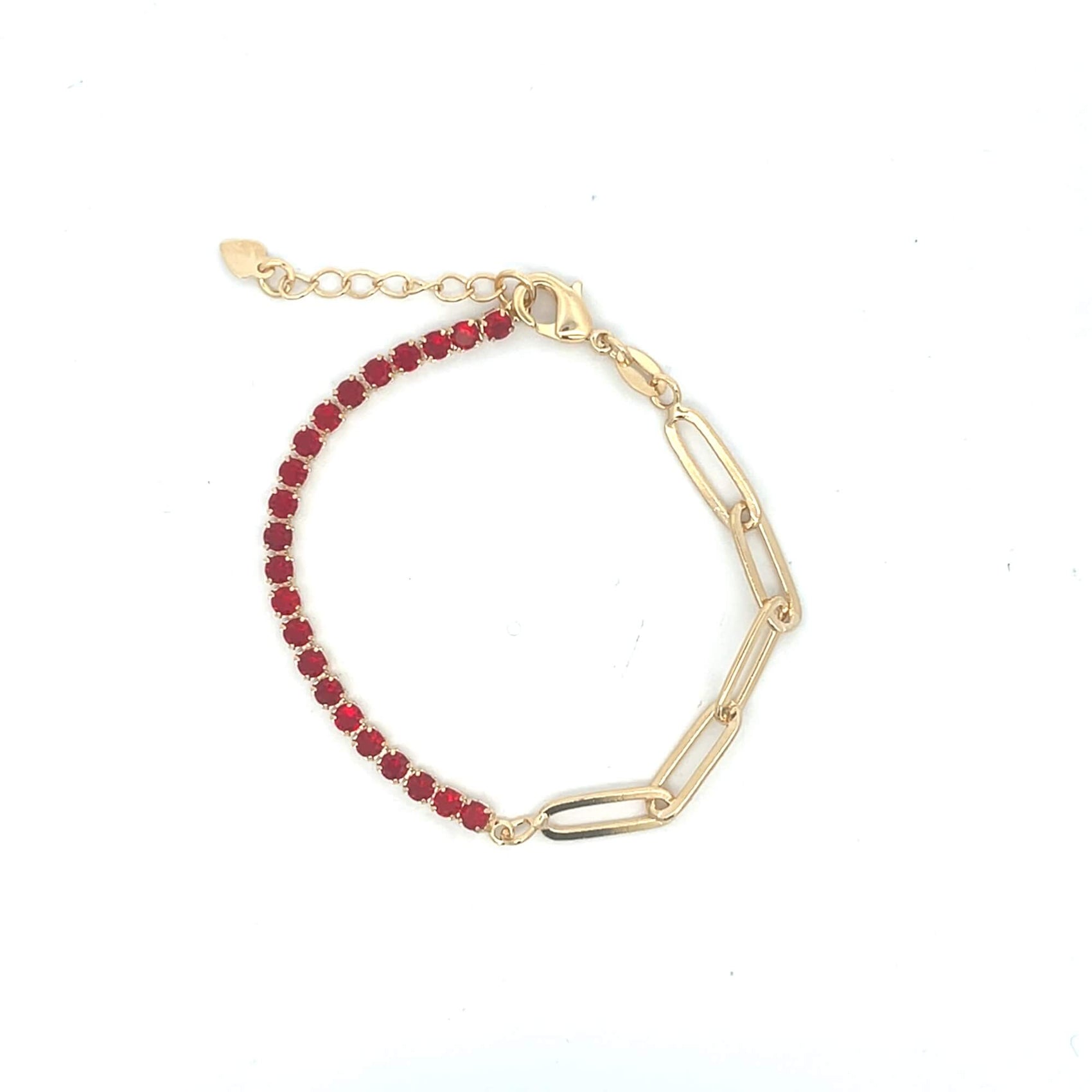 A gold chain bracelet features vibrant red rhinestone crystals on one half and chunky paperclip links on the other against a white background.