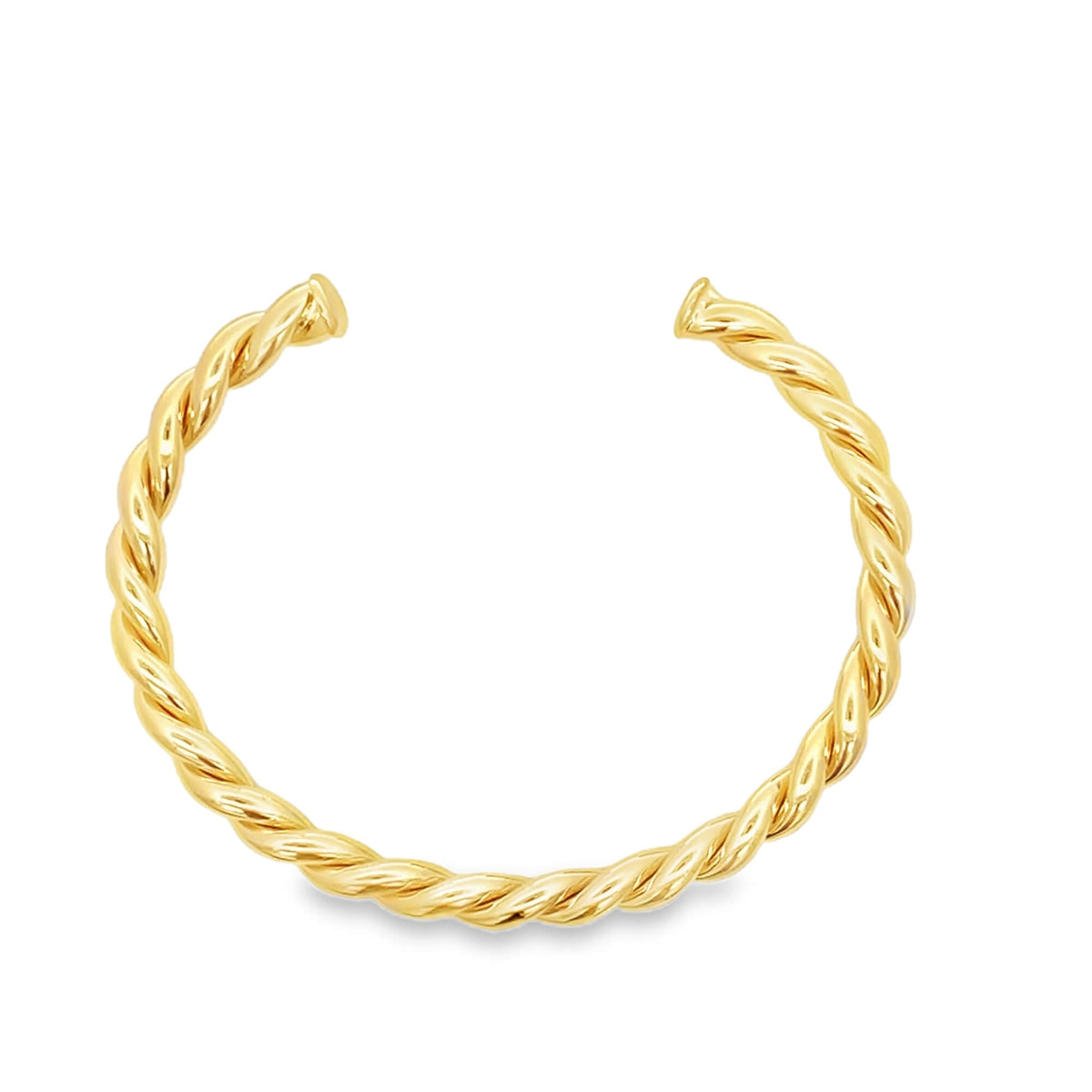 Gold braided bangle on a white background