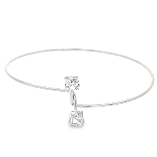 Silver colored armlet with square pendant on a white background