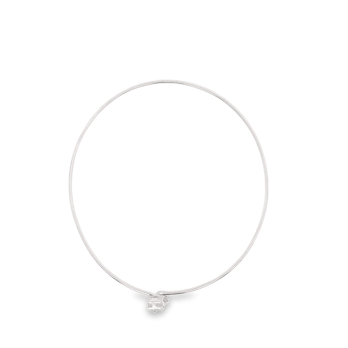 Silver colored armlet on a white background
