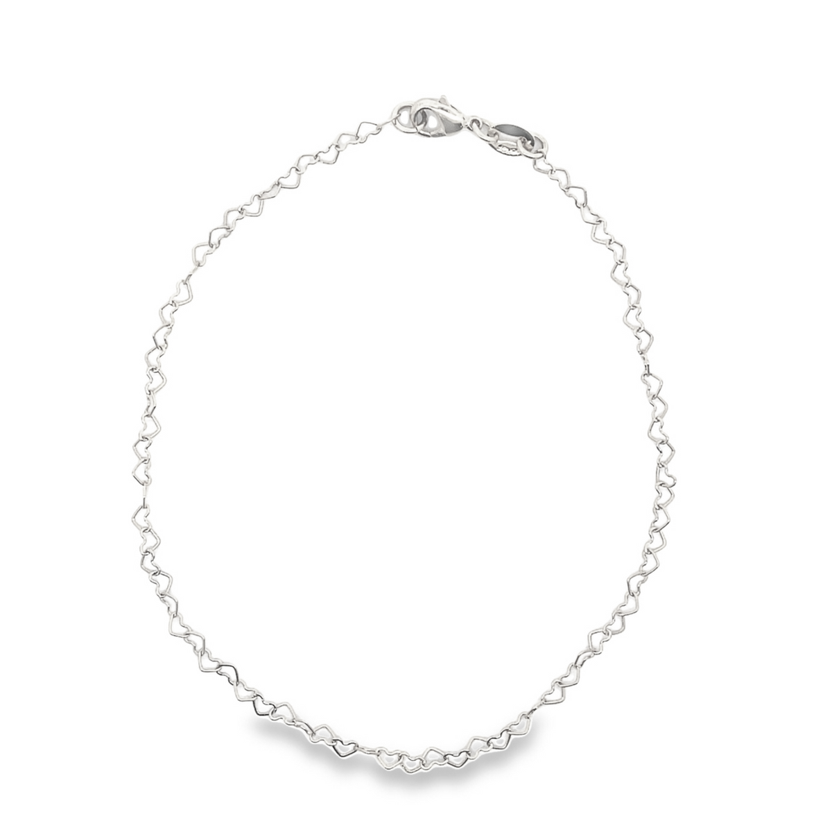A delicate silver heart-link chain bracelet rests on a white background, showcasing its interlocking heart pattern and secure clasp.