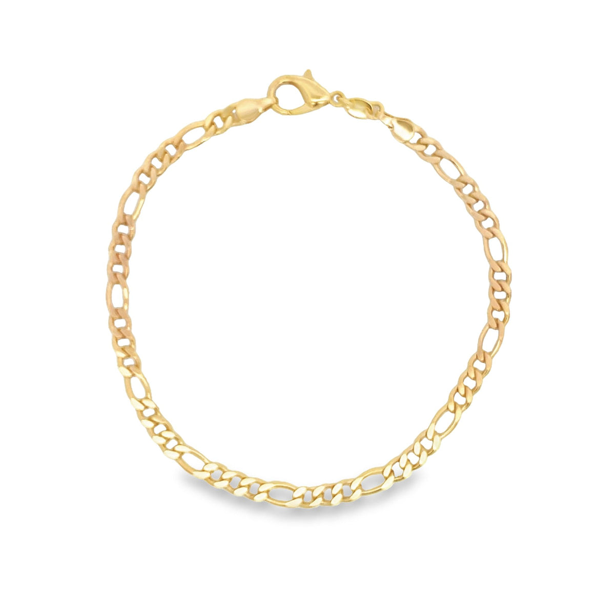 A delicate gold Figaro link chain bracelet rests in a circle on a white background, featuring a secure lobster claw clasp.