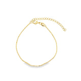 Gold bracelet on a white background