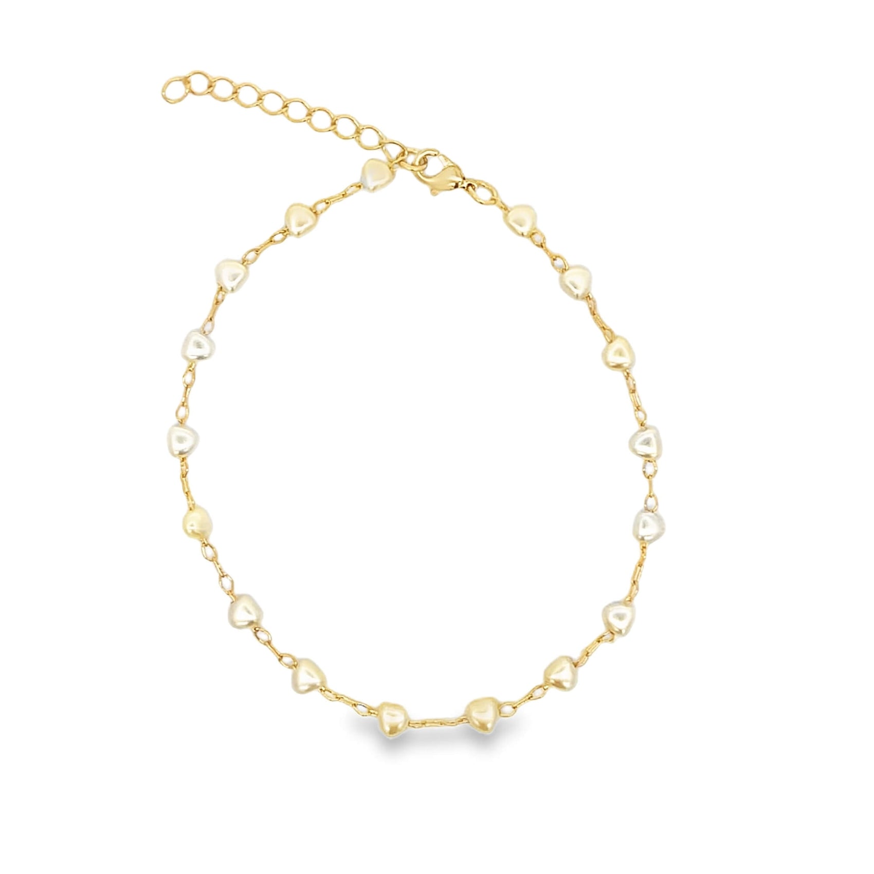 A delicate gold chain bracelet features alternating white and gold heart-shaped beads against a clean white background.