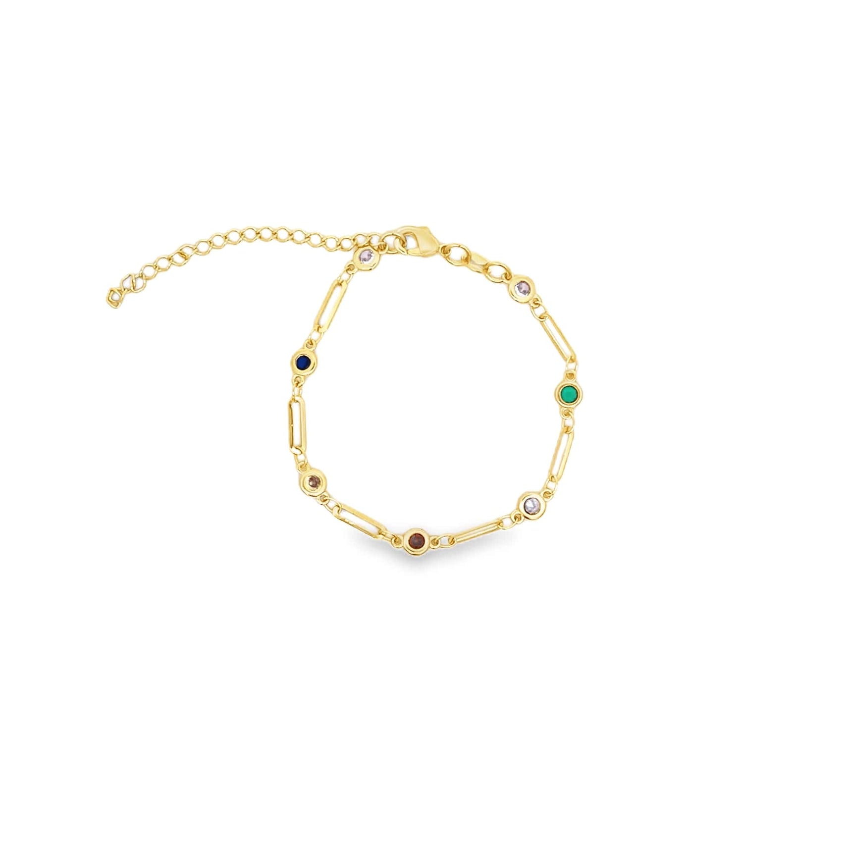 A delicate gold chain bracelet features alternating paperclip links and colorful gemstone bezels against a white background.