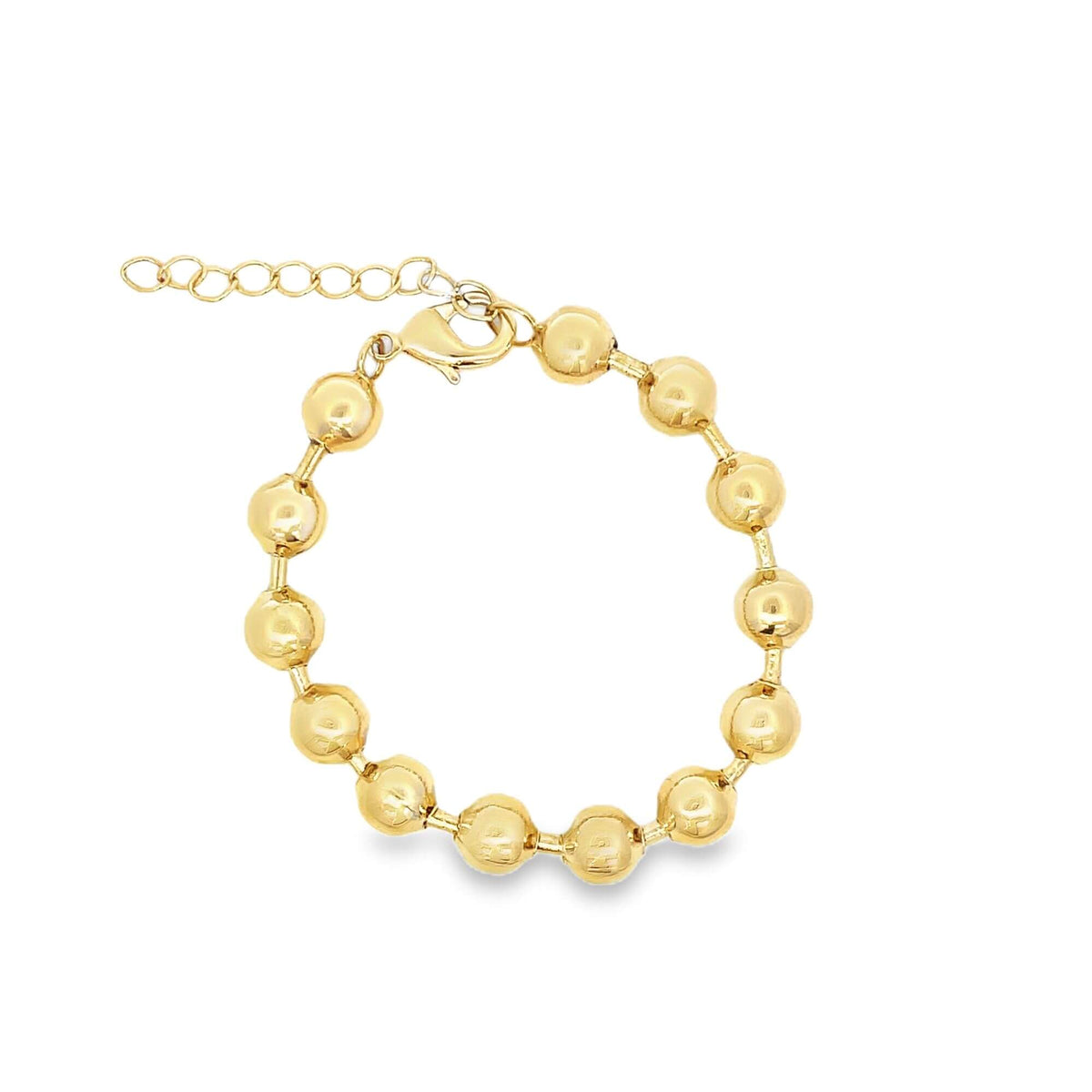 A shiny gold bead bracelet features a lobster clasp and an adjustable extension chain on a white background.