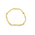 A minimalist gold cube bead bracelet rests against a clean white background.