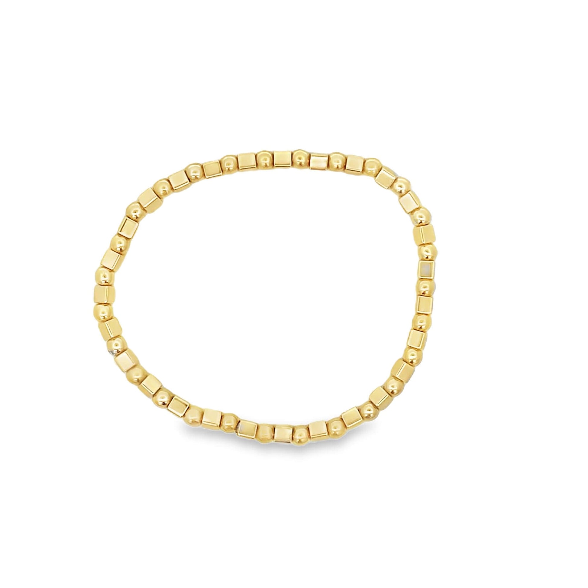 A sleek gold beaded stretch bracelet features alternating round and cube-shaped metallic beads arranged in a continuous circle on a plain white background.