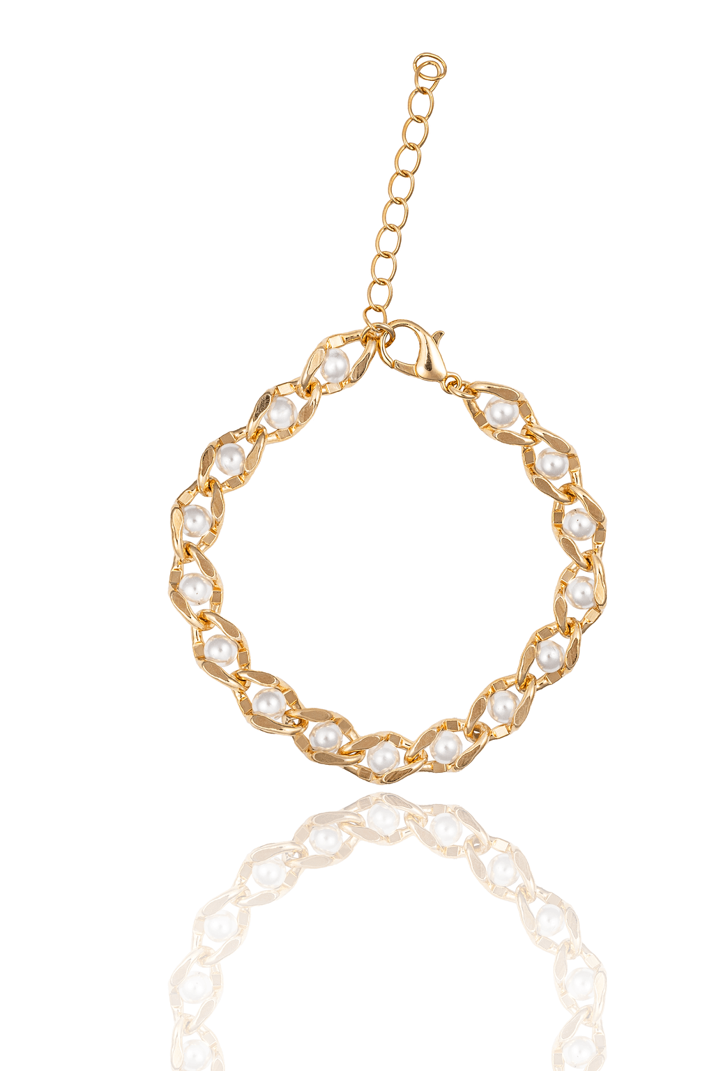 A gleaming gold chain bracelet inlaid with delicate white pearls rests on a reflective white surface, featuring an adjustable extender chain with a lobster clasp.