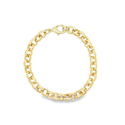 A shiny yellow gold curb link bracelet rests in a circle against a white background.