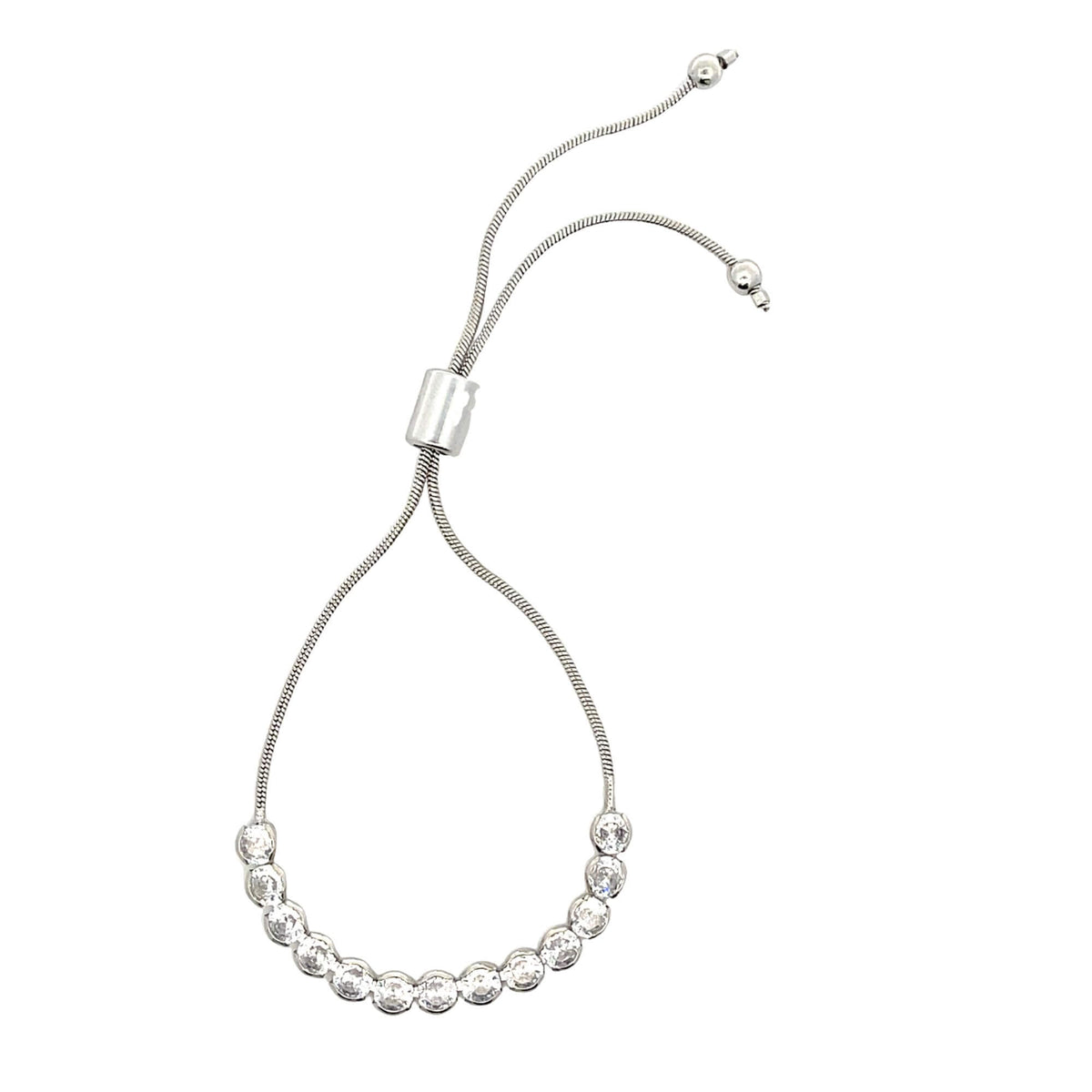 A silver adjustable bolo bracelet features a curved line of sparkling cubic zirconia stones and delicate snake chains against a white background.