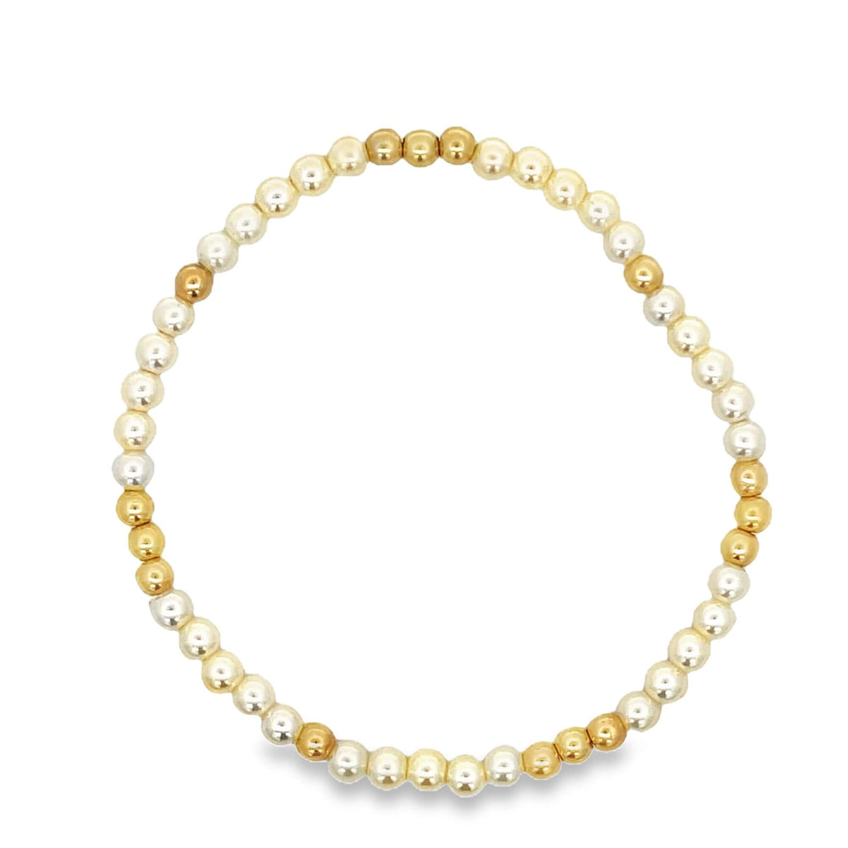 A delicate beaded bracelet features an alternating pattern of shiny gold and silver metallic ball beads arranged in a circle.