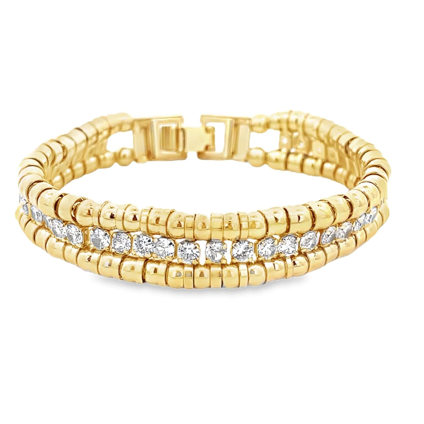 A gold multi-strand beaded bracelet features a sparkling center row of diamonds against a white background.