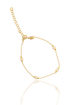 A delicate gold chain bracelet features interspersed pearls and an adjustable extension chain against a white background.