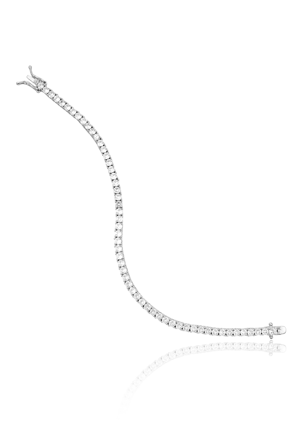 A sparkling diamond tennis bracelet with a secure clasp curves gracefully on a white reflective surface.