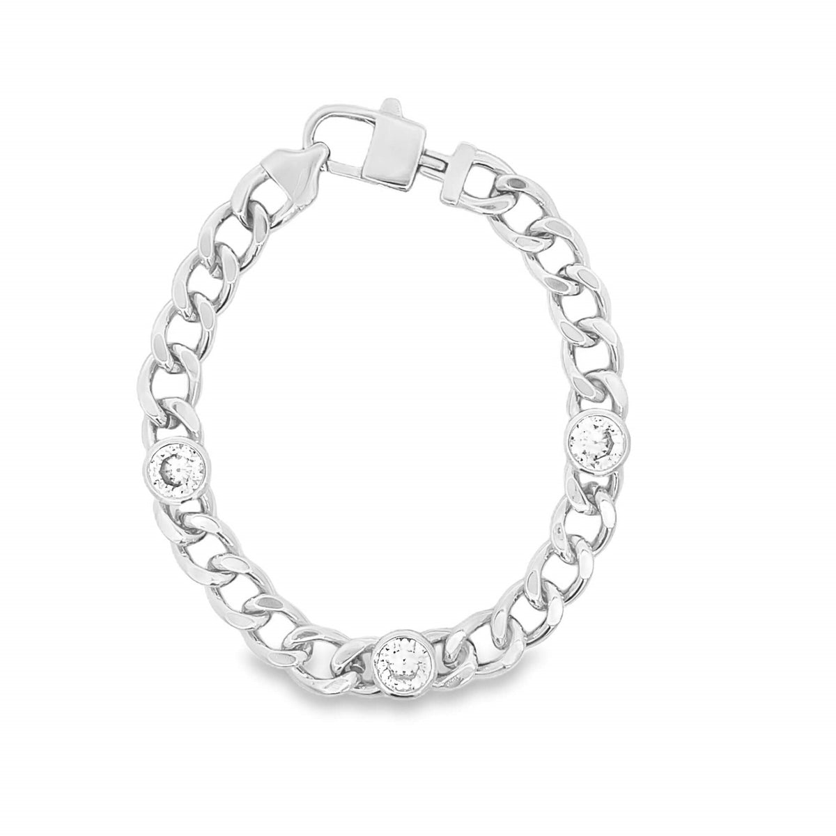 A gleaming silver curb chain bracelet sparkles with three round bezel-set diamonds against a clean white background.