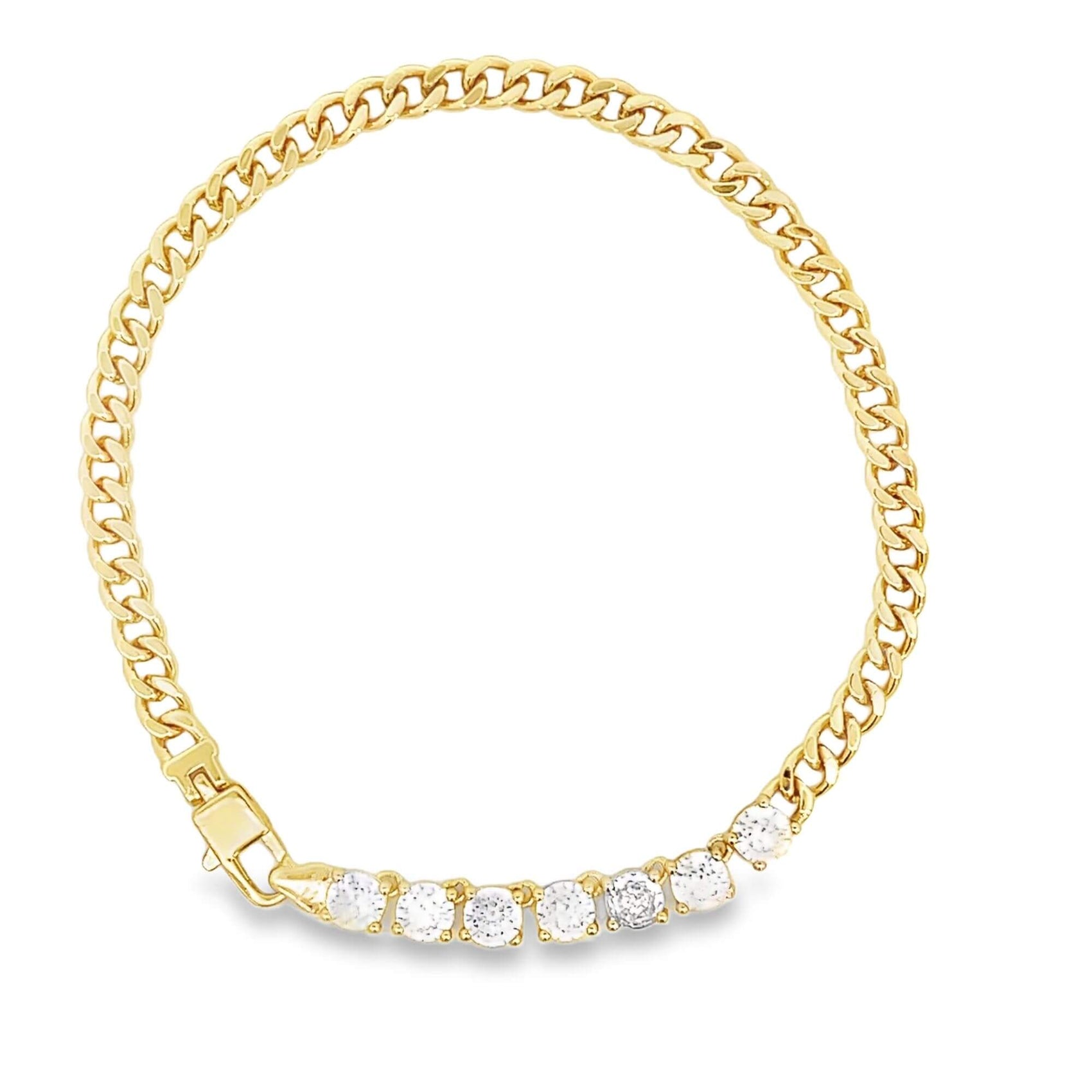 A gold curb-chain bracelet showcases a row of sparkling diamond-like stones set near the clasp.