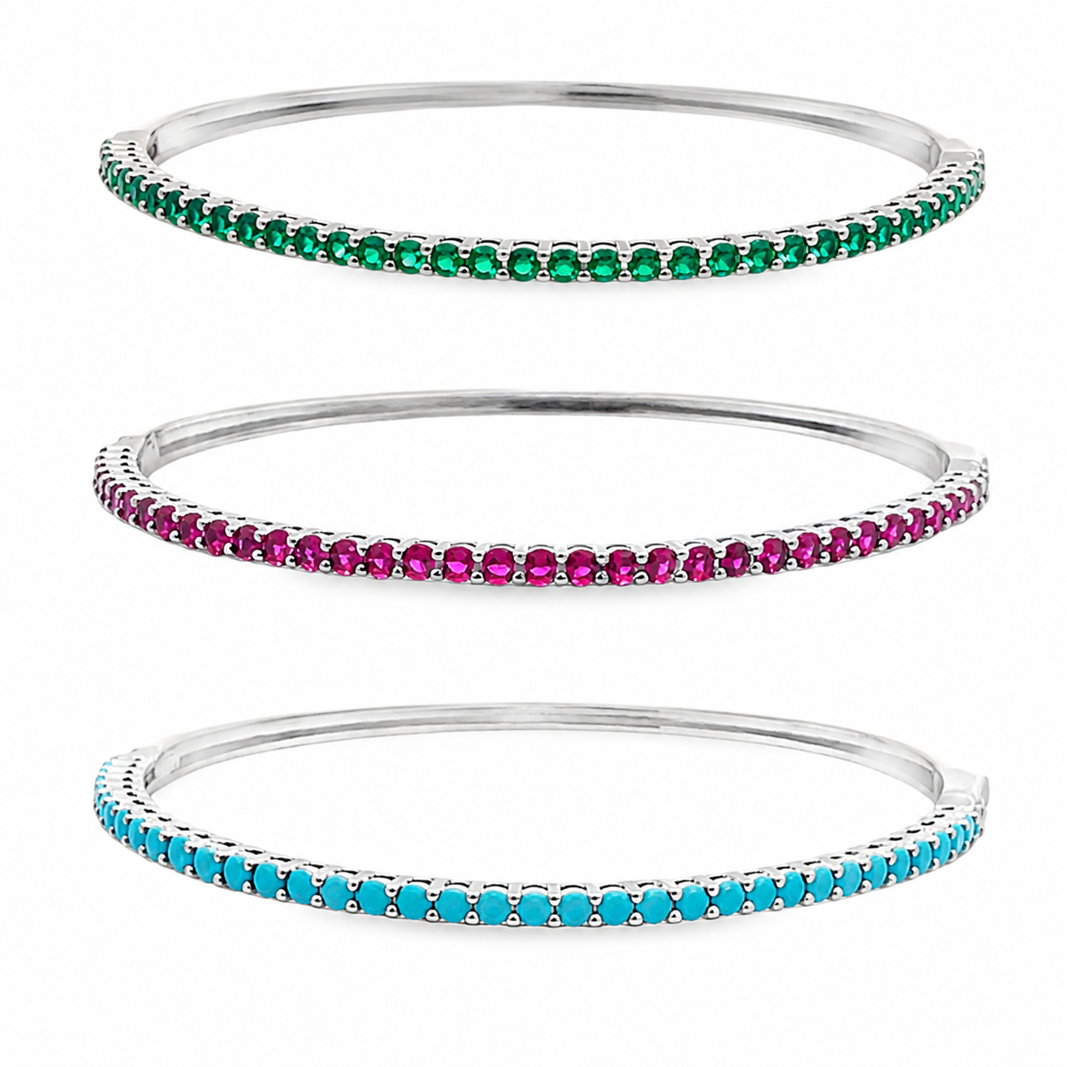 Elegant slim tennis bangle bracelet with sparkling colored CZ stones. Stackable minimalist design available in multiple color options for everyday luxury styling.