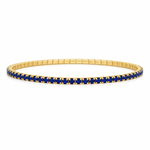 Elegant stretch tennis bracelet featuring sparkling colored CZ stones and a flexible elastic design for effortless wear. Perfect for stacking or wearing alone. Available in multiple vibrant colors including sapphire blue, emerald green, ruby red, black, and clear.