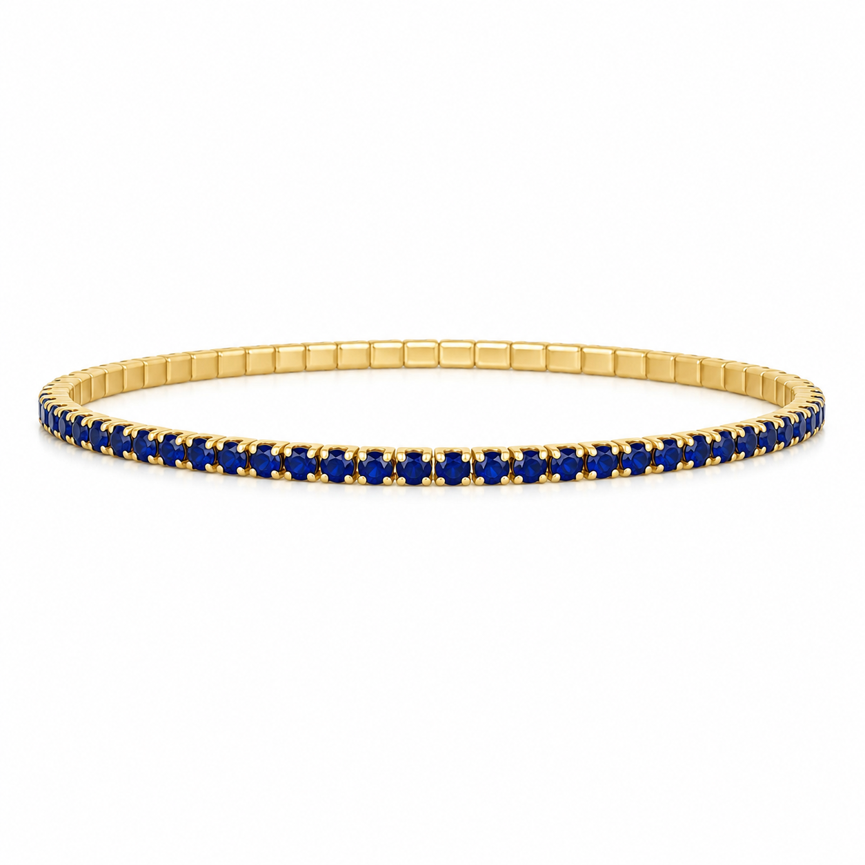 Elegant stretch tennis bracelet featuring sparkling colored CZ stones and a flexible elastic design for effortless wear. Perfect for stacking or wearing alone. Available in multiple vibrant colors including sapphire blue, emerald green, ruby red, black, and clear.
