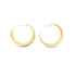 A pair of thick gold hoop earrings rests against a clean white background.
