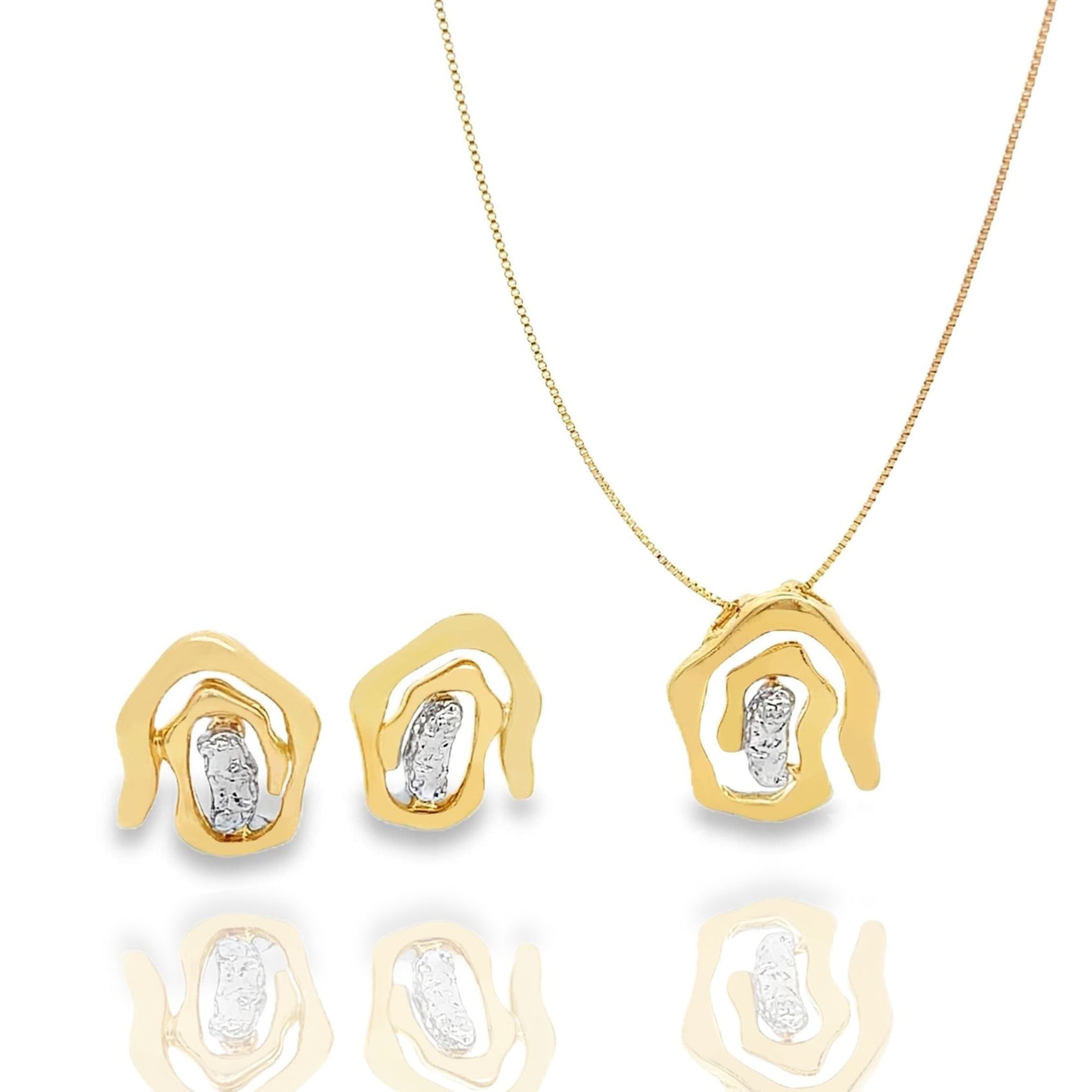 A matching gold necklace and earring set features abstract geometric pendants with textured white stone accents on a white background.
